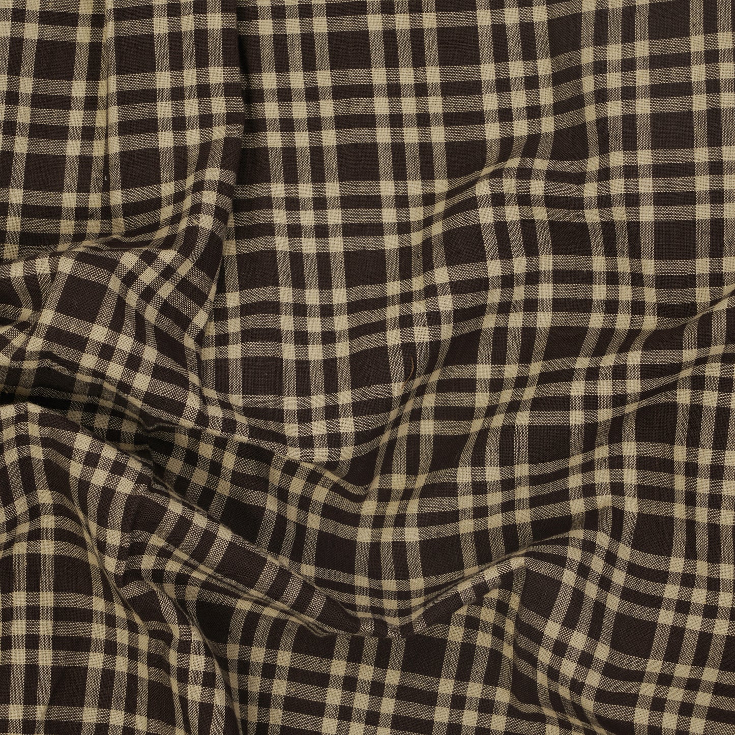 Laid flat view of dark brown check cotton shirt