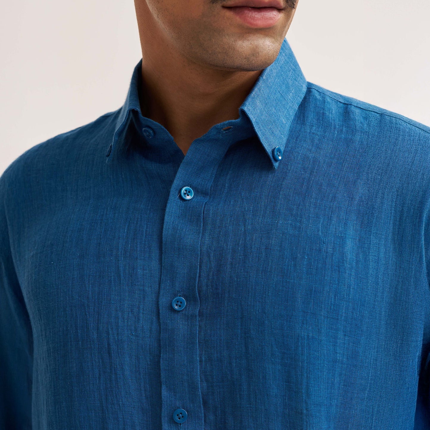 Back view of slim fit indigo linen shirt