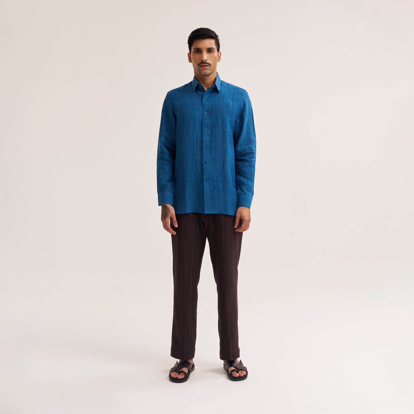 Casual styling of slim fit indigo linen shirt for everyday wear