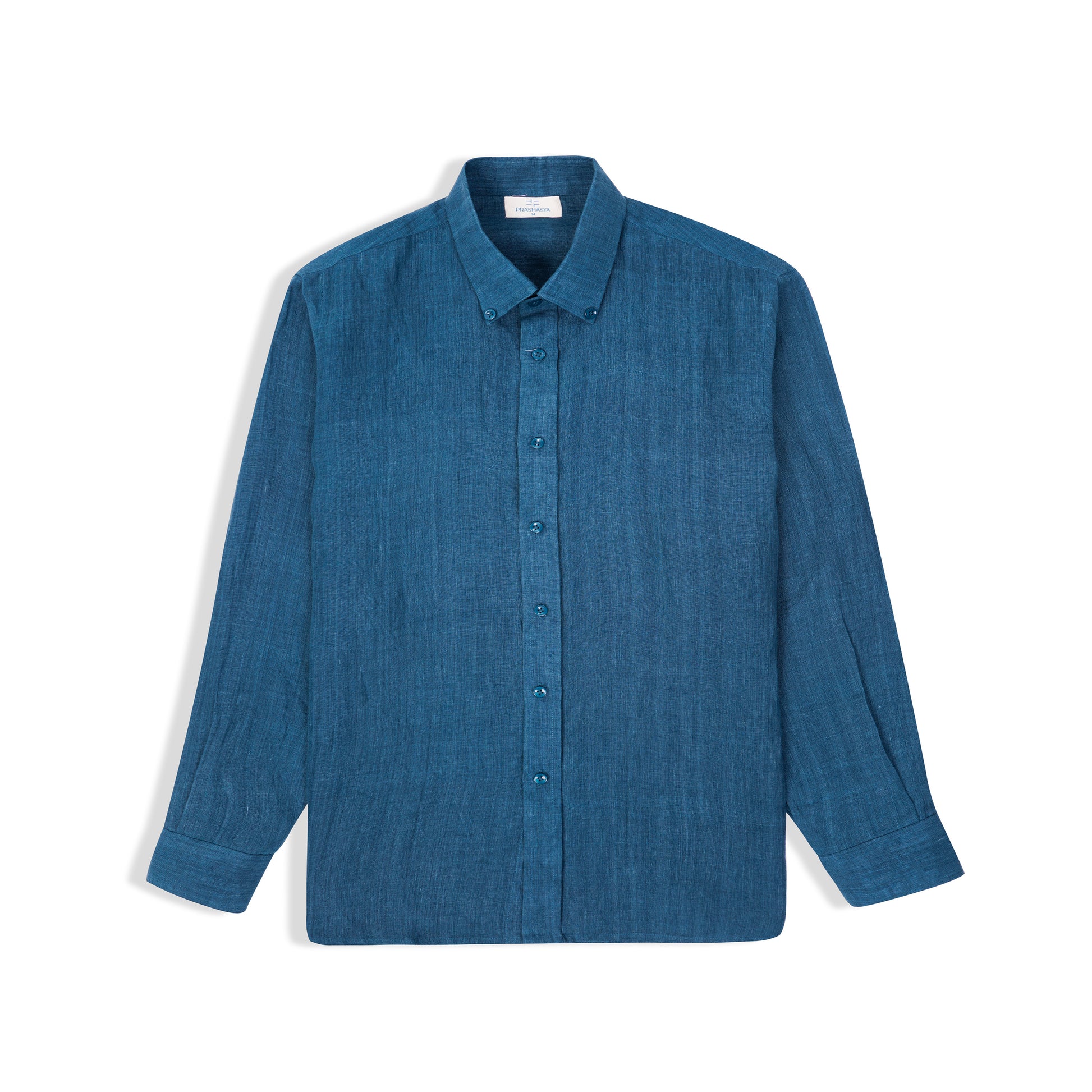 Indigo linen shirt displayed on hanger